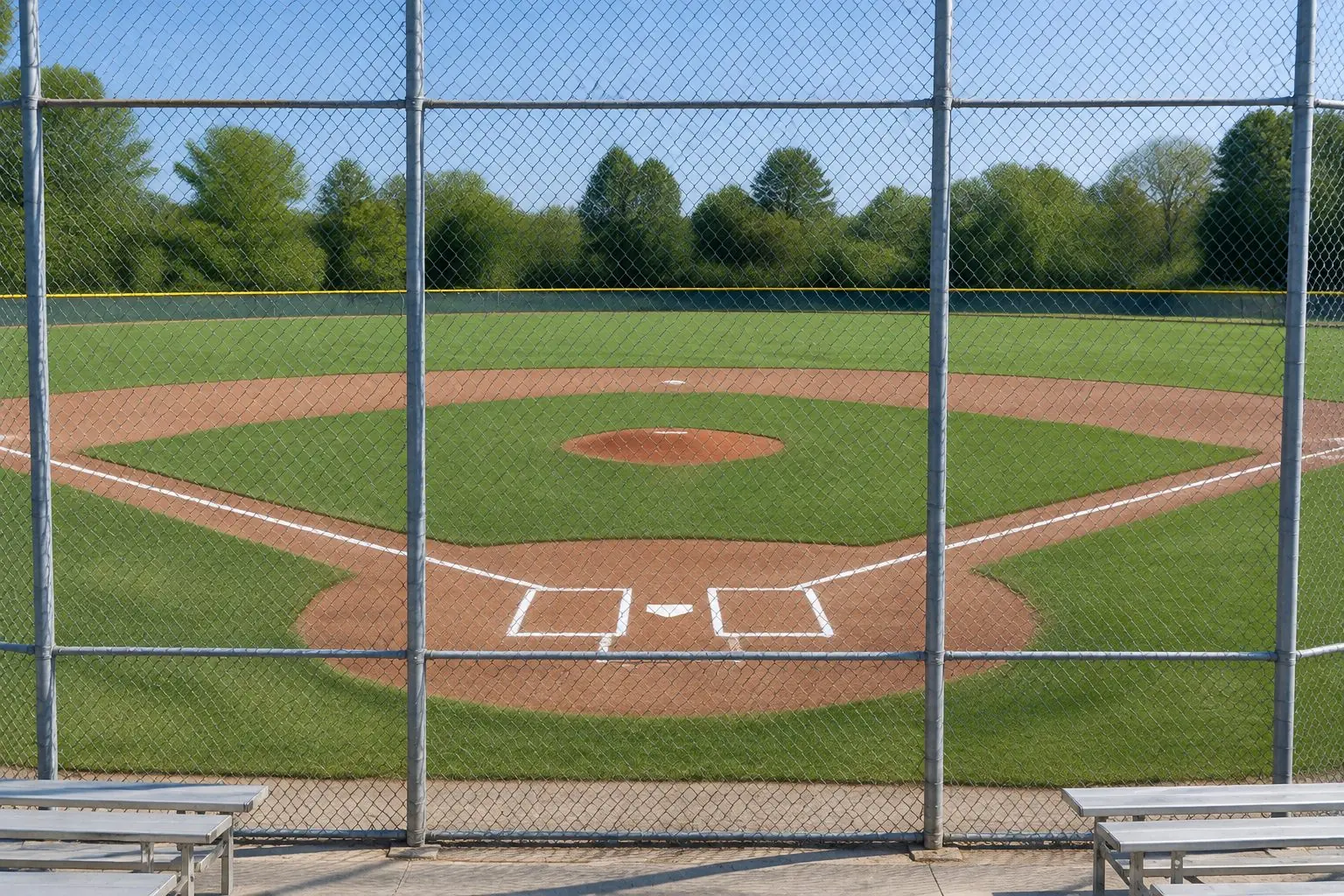 Completed youth baseball field with a groomed infield and fresh chalk lines, serving Dayton, OH