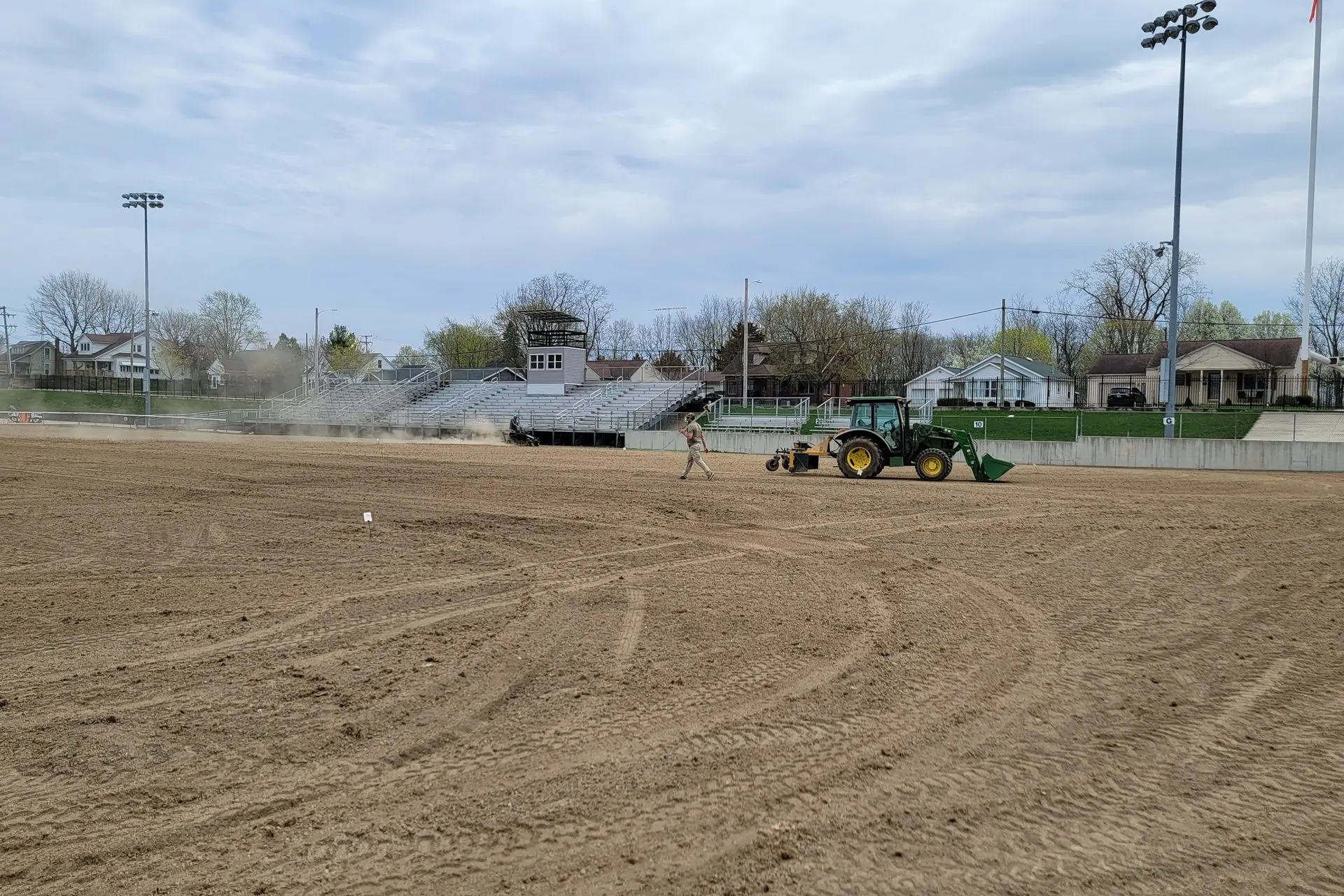 Infield being dragged and leveled during a baseball field renovation, serving Cincinnati, OH
