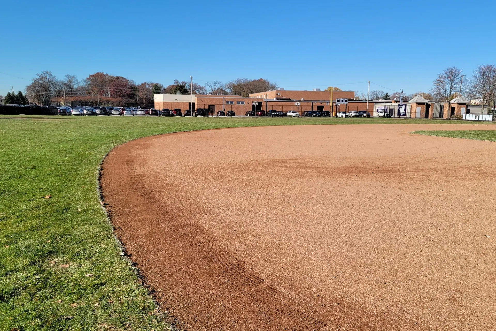 Finished softball infield skin with a clean edge to new turf, serving Dayton, OH
