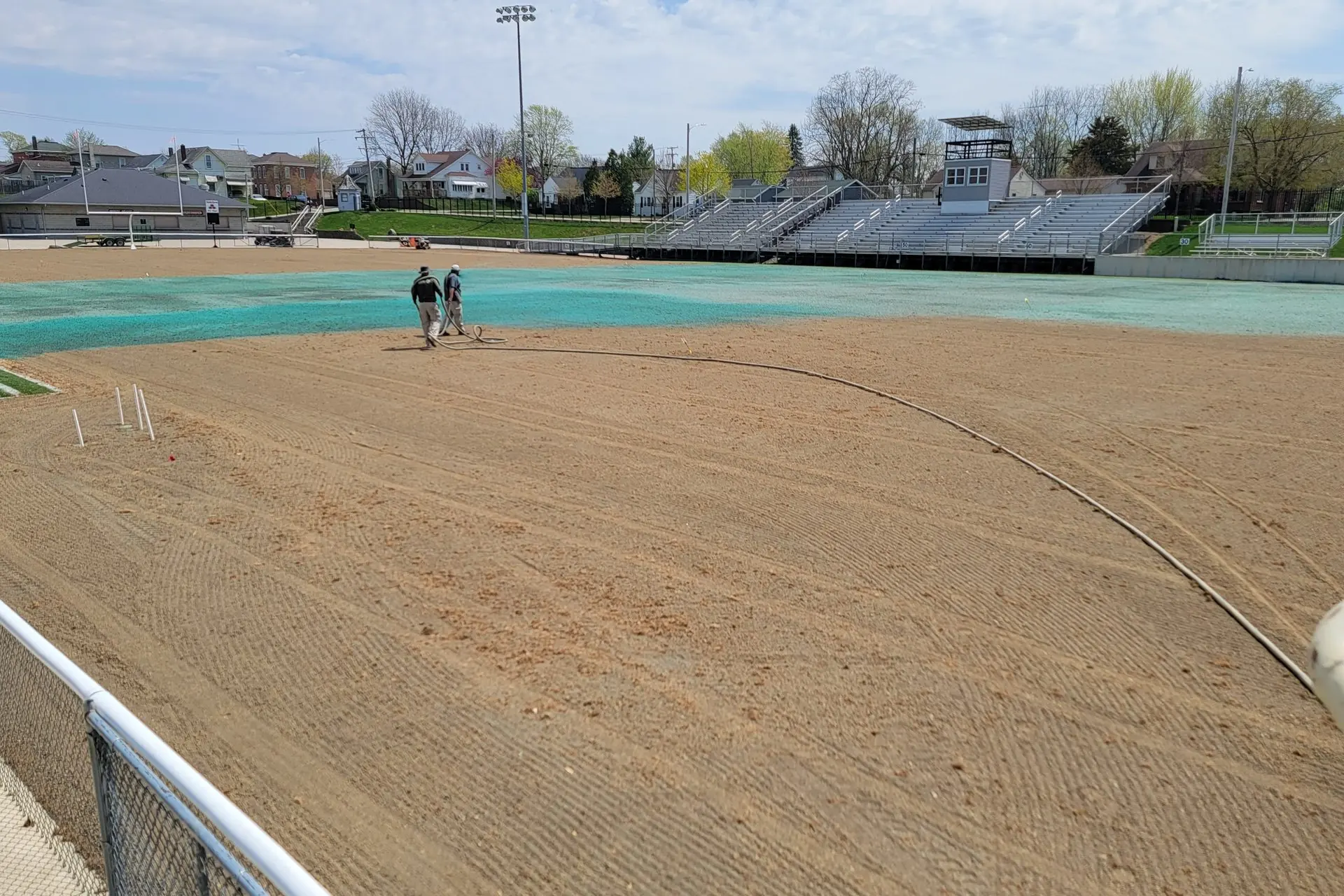 Newly seeded infield turf establishing on a renovated ball field, serving Dayton, OH